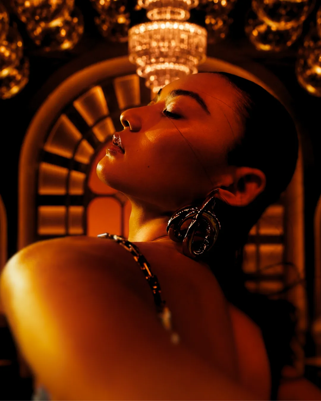A guest framed by the illuminated arch at MIRA